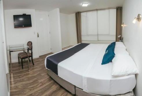 Foto de una habitación de Ayenda Alma Casa Boutique