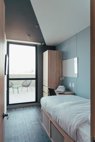 Foto de una habitación de The Spot Chía