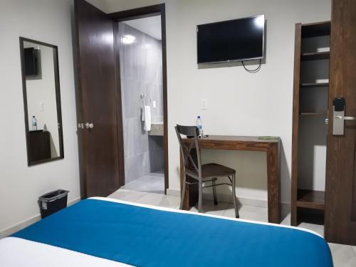 Foto de una habitación de Hotel Pabela