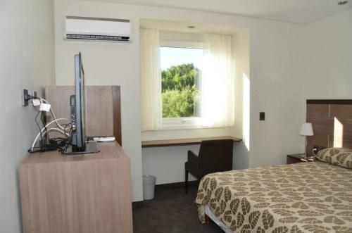 Foto de una habitación de Hotel Terra Malal
