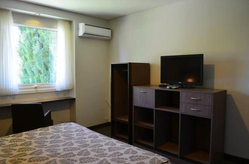 Foto de una habitación de Hotel Terra Malal