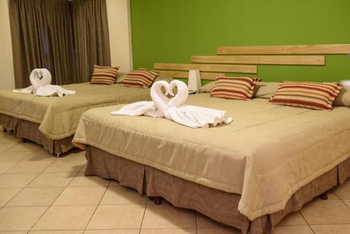 Foto de una habitación de AVEMAR Apart Hotel
