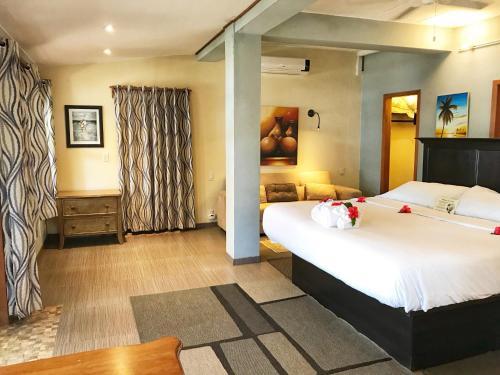 Foto de una habitación de Maya Beach Hotel