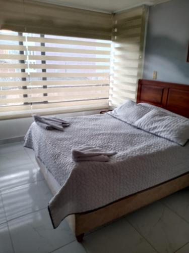 Foto de una habitación de HOTEL ZUHE