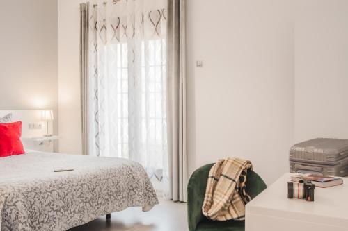 Foto de una habitación de Hotel Amphora Alojamiento