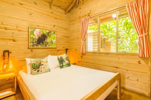 Foto de una habitación de Hotel El Mono Feliz