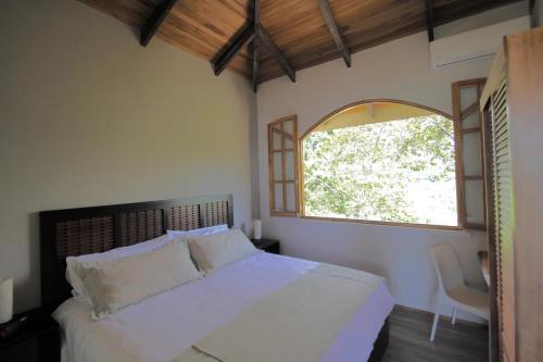 Foto de una habitación de Hotel El Castillo - Adults only