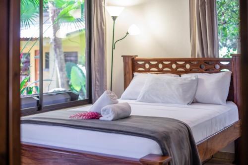 Foto de una habitación de Zula Inn Aparthotel