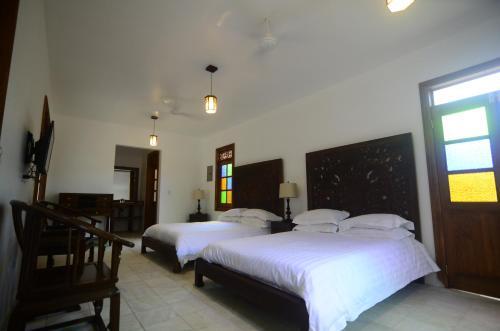 Foto de una habitación de Lanna Ban Hotel