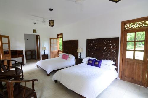 Foto de una habitación de Lanna Ban Hotel