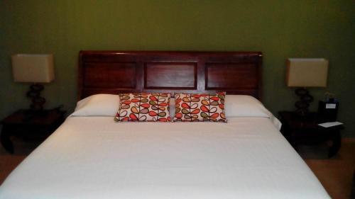 Foto de una habitación de Hotel 1915 INN &amp;amp; SUITES