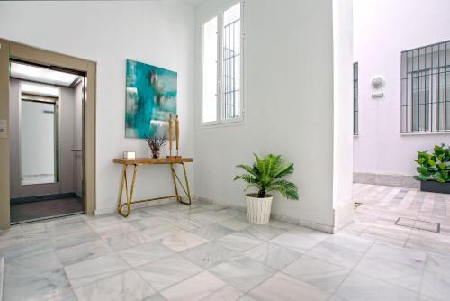 Foto de una habitación de Apartamentos Genteel Home Recaredo