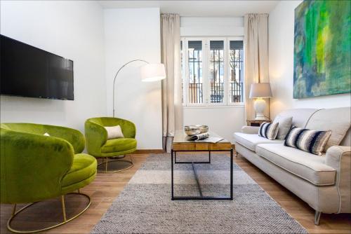 Foto de una habitación de Apartamentos Genteel Home Recaredo