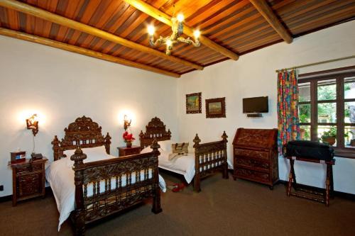 Foto de una habitación de Hotel Hacienda Hosteria Chorlavi