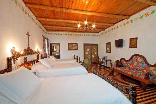 Foto de una habitación de Hotel Hacienda Hosteria Chorlavi