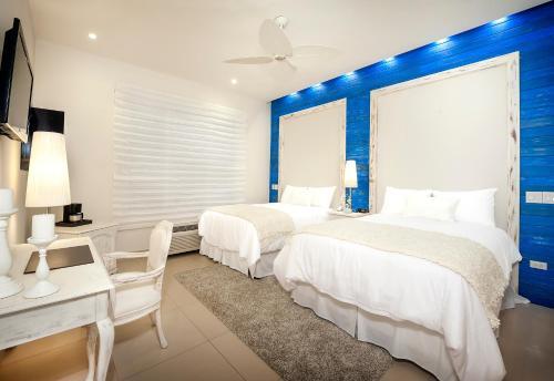 Foto de una habitación de Elements Hotel Boutique