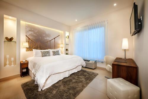 Foto de una habitación de Elements Hotel Boutique