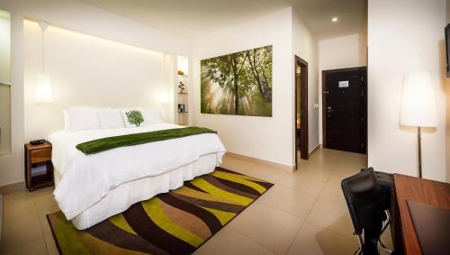 Foto de una habitación de Elements Hotel Boutique