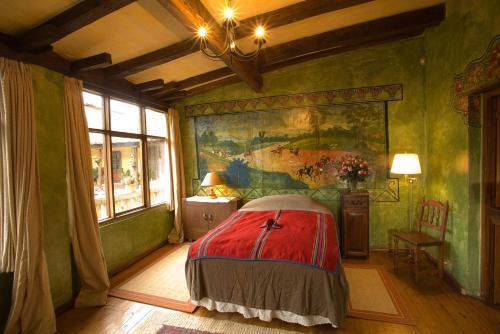 Foto de una habitación de Hotel Hacienda San Agustin de Callo