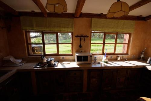Foto de una habitación de Hotel Hacienda San Agustin de Callo