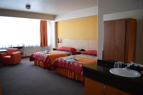 Foto de una habitación de Hotel La Paz