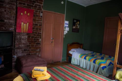 Foto de una habitación de Blue House Youth Hostel