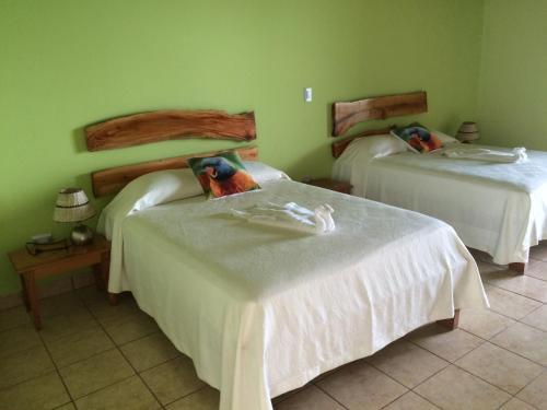 Foto de una habitación de Hotel Bahia Taitza