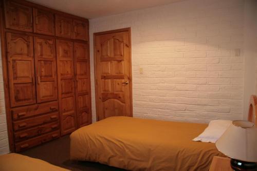 Foto de una habitación de Apartamentos Los Quipus
