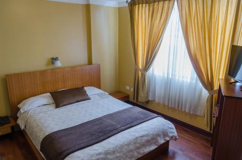 Foto de una habitación de Hotel El Altar