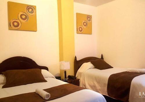 Foto de una habitación de La Merced Plaza Hostal