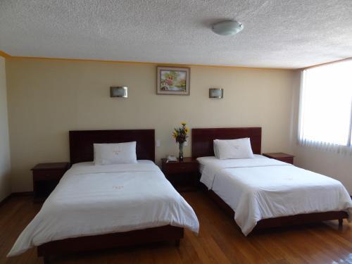 Foto de una habitación de Hotel L&amp;amp;L