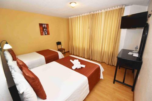 Foto de una habitación de Hotel Montecarlo