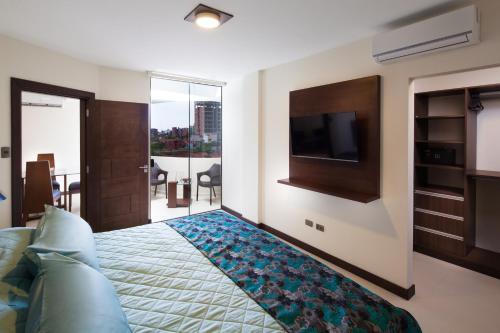Foto de una habitación de Mai Suites Apart Hotel