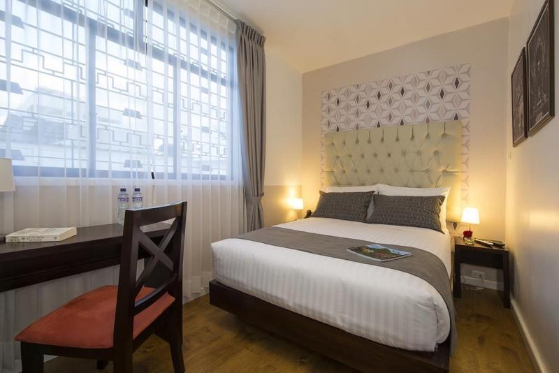 Foto de una habitación de TERRA PREMIUM Hostal Boutique