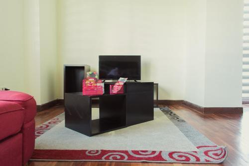 Foto de una habitación de Hotel Luxstone Executive &amp;amp; Suites