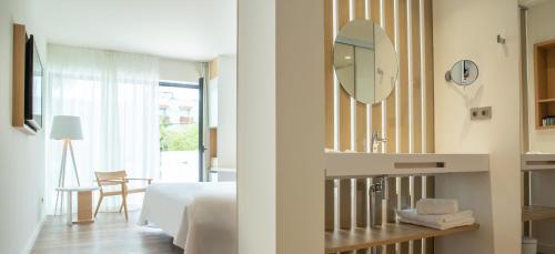 Foto de una habitación de Mònica Hotel Boutique