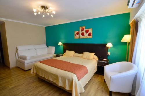 Foto de una habitación de Alto Verde Suite &amp;amp; Apart