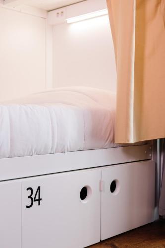 Foto de una habitación de Lisbon South Hostel