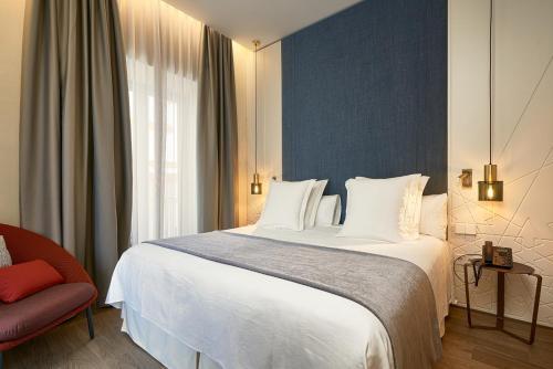 Foto de una habitación de Suites Murillo Plaza Sta. Cruz