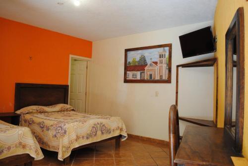 Foto de una habitación de Hotel Real de la Montaña