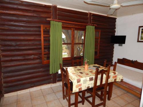 Foto de una habitación de Cabañas Los Troncos
