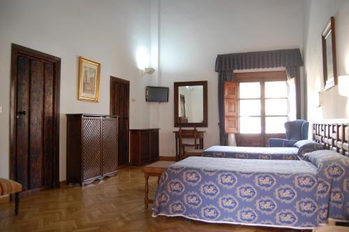 Foto de una habitación de Hospederia del Real Monasterio