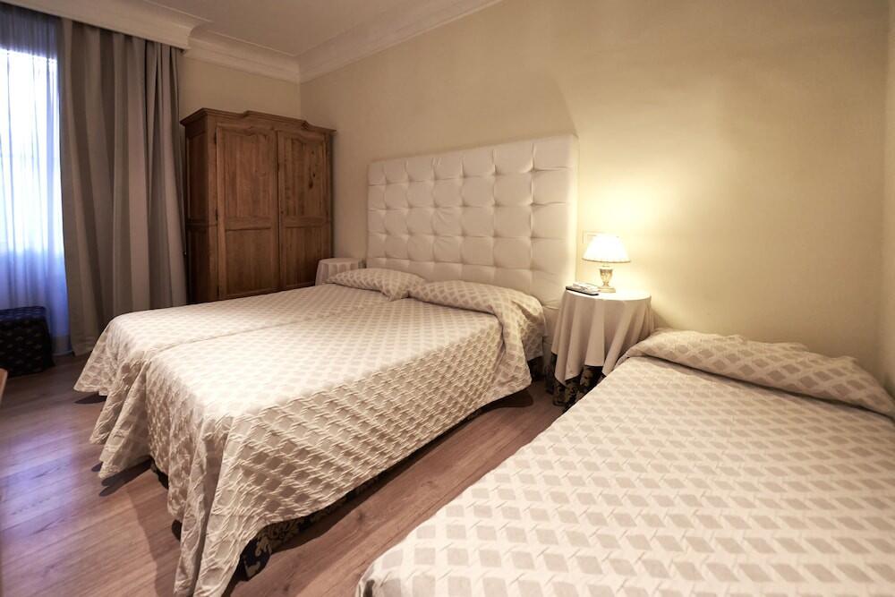 Foto de una habitación de Hotel Condotti 29