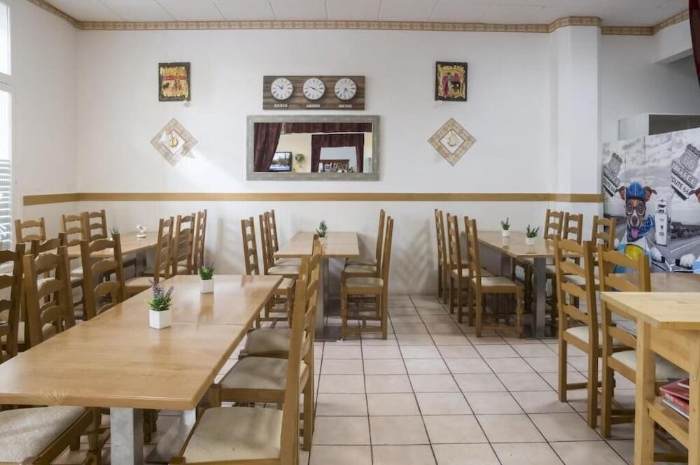Foto de restauración de Citotel Hôtel Cesar