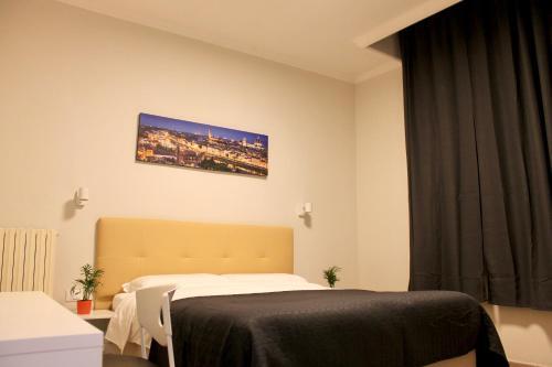 Foto de una habitación de Hotel 900 Toscana Florence