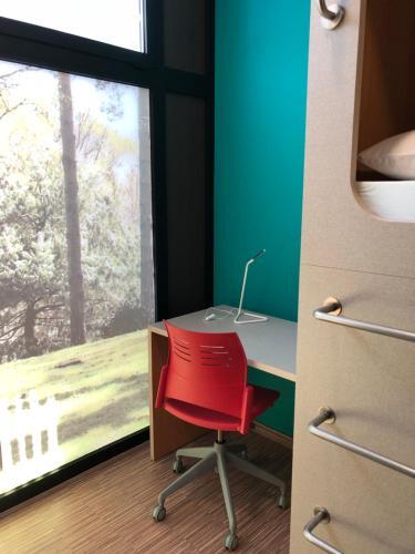 Foto de una habitación de Hoteles cápsula Andaina