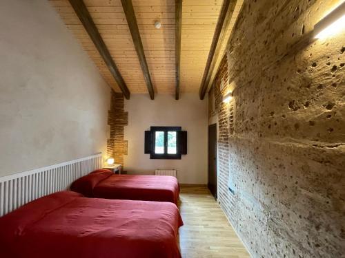 Foto de una habitación de APARTAMENTOS RURALES POSADA DE LLERENA