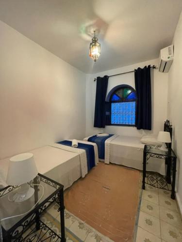 Foto de una habitación de Hotel Dar Nokhba Inn