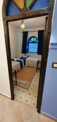 Foto de una habitación de Hotel Dar Nokhba Inn