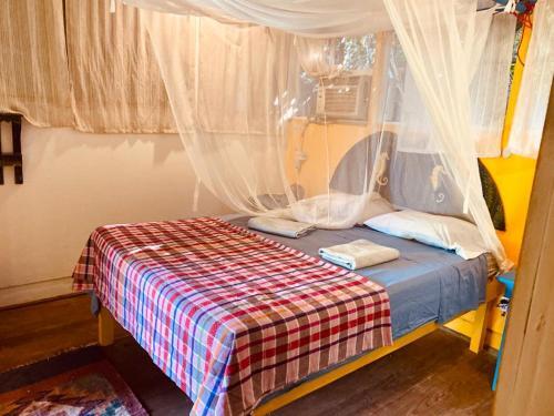 Foto de una habitación de Hotel La Casa Rosada